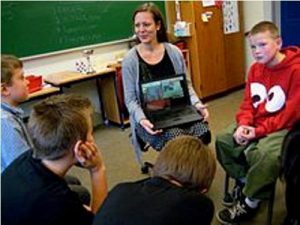 laptop and teacher